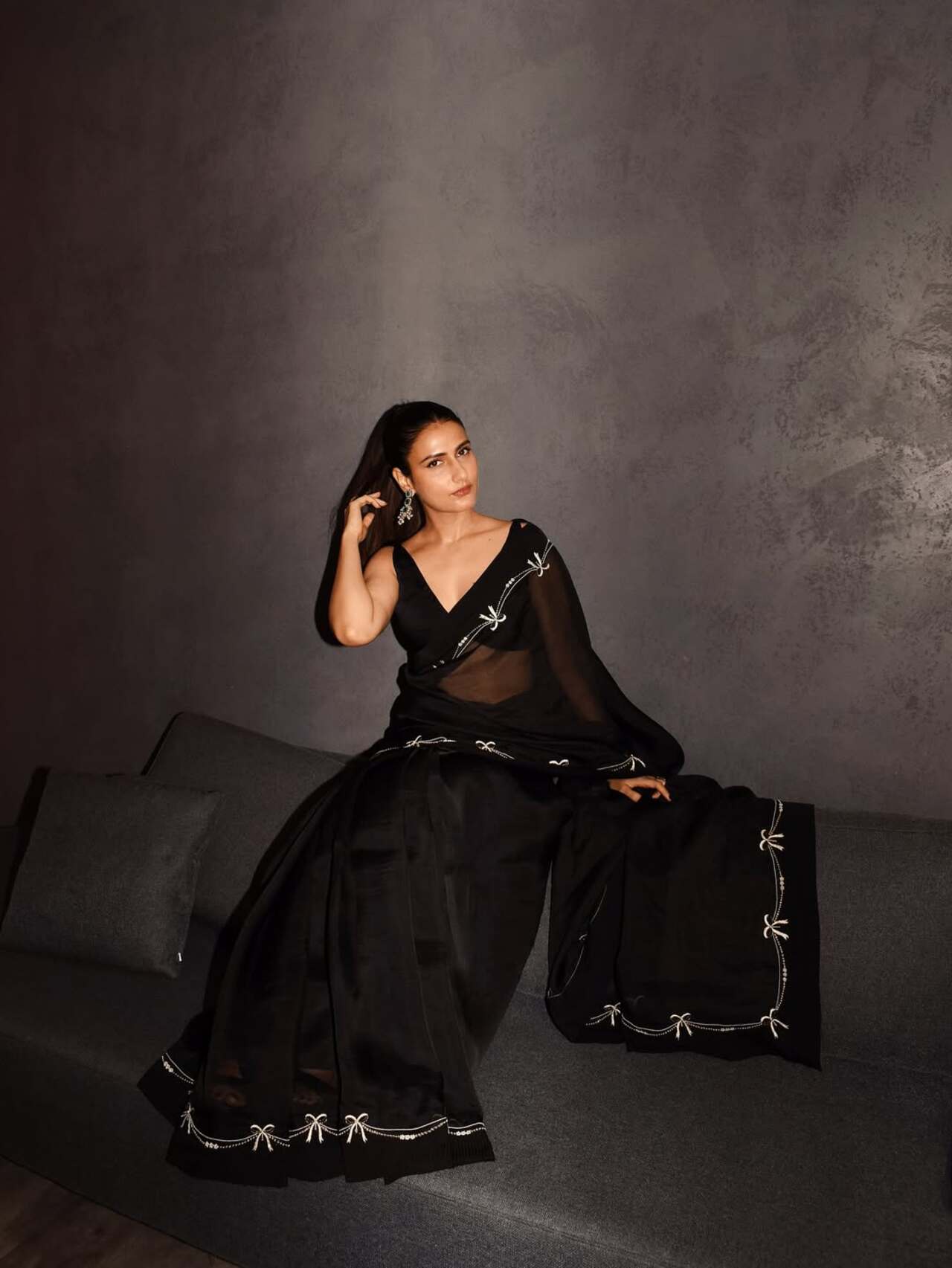 Fatima closes her style chapter on a strong note in a sheer black organza saree with white bow motifs—elegant yet fierce, much like her on-screen persona